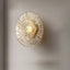 Clara wall sconce in solid brass and faceted glass