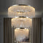 Alleri crystal foyer chandelier in a grand entryway