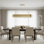 Giovanni gold crystal dining chandelier over a dining table