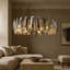 Lazzo tiered crystal chandelier in a modern dining room