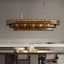 Riviera oval smoke glass chandelier over a dining table
