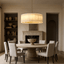 Valmont 31-inch round marble chandelier glowing warm from within