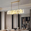 Norham linear marble chandelier in natural stone and copper