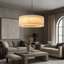 Valmont 39-inch round marble chandelier glowing warm from within