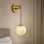 Horrin marble ball wall sconce full view