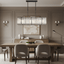 Botega crystal dining chandelier on black steel over a table