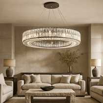 The Hutton crystal chandelier from Morsale.com casting refined sparkle, K9 crystal contrasting a matte black frame.