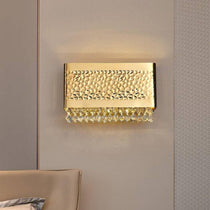 Detail of clear K9 crystal on the Bern sconce's gold-plated stainless steel frame, from Morsale.com.