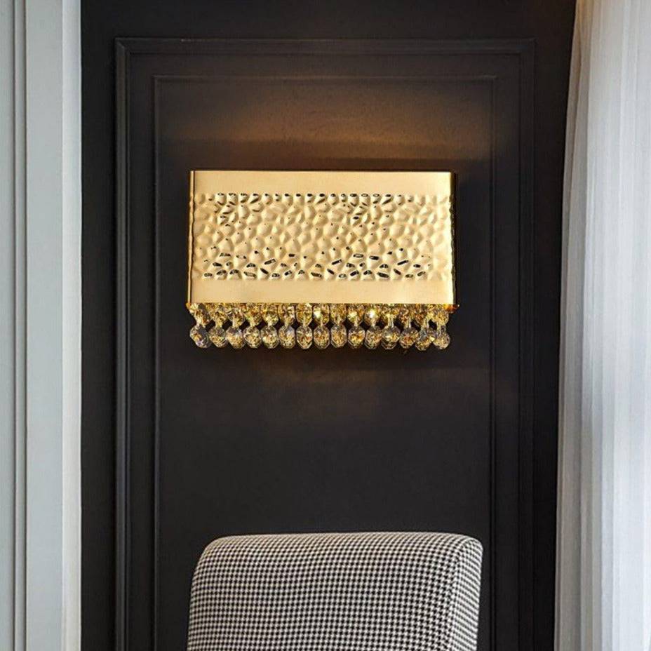 Side view of the Bern gold plated wall sconce by Morsale.com showing the compact crystal and gold frame profile.