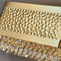 The Bern gold plated sconce by Morsale.com in a dining room, clear crystal and gold finish.