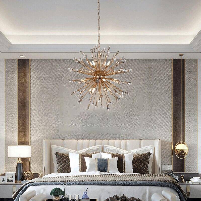 The Weston Sputnik crystal chandelier from Morsale.com above a dining table, rose gold arms radiating with crystal sparkle.