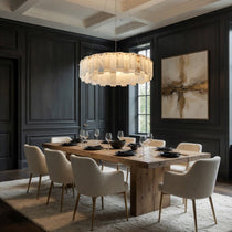 Benett marble chandelier in natural stone over a table