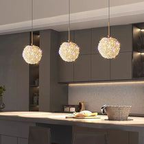 Detail of crystal prisms on the El Sol pendant