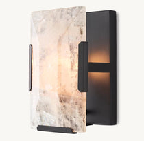 Brookhill black calcite sconce with glowing stone shade