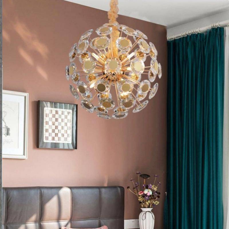 The Dandelion crystal chandelier from Morsale.com casting bright sparkle, nine crystal-tipped arms on a gold frame.