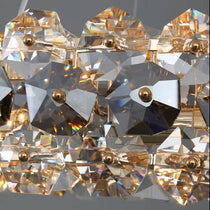 Detail of smoke grey and clear K9 crystal on the Monte chandelier's polished steel frame, from Morsale.com.