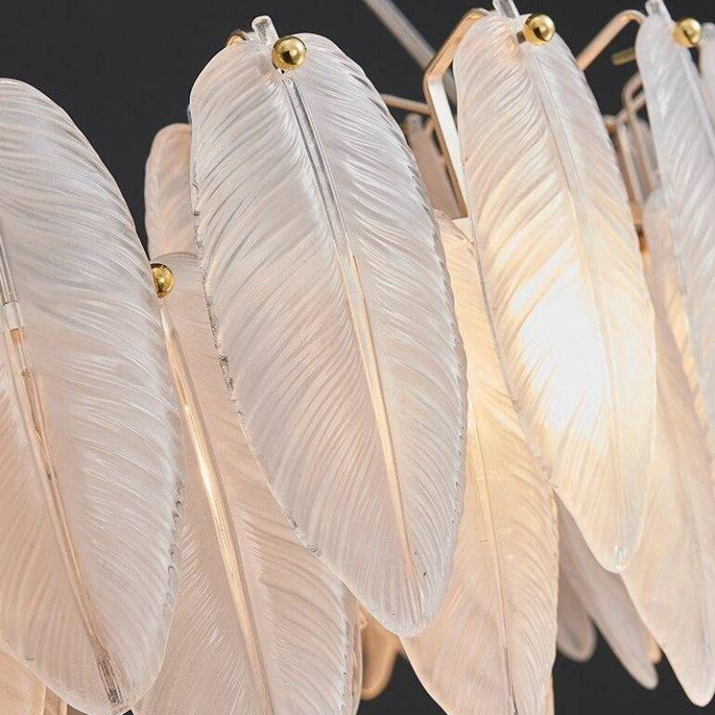 Detail of leaf-cut art glass on the Foglia chandelier's polished steel frame, from Morsale.com.