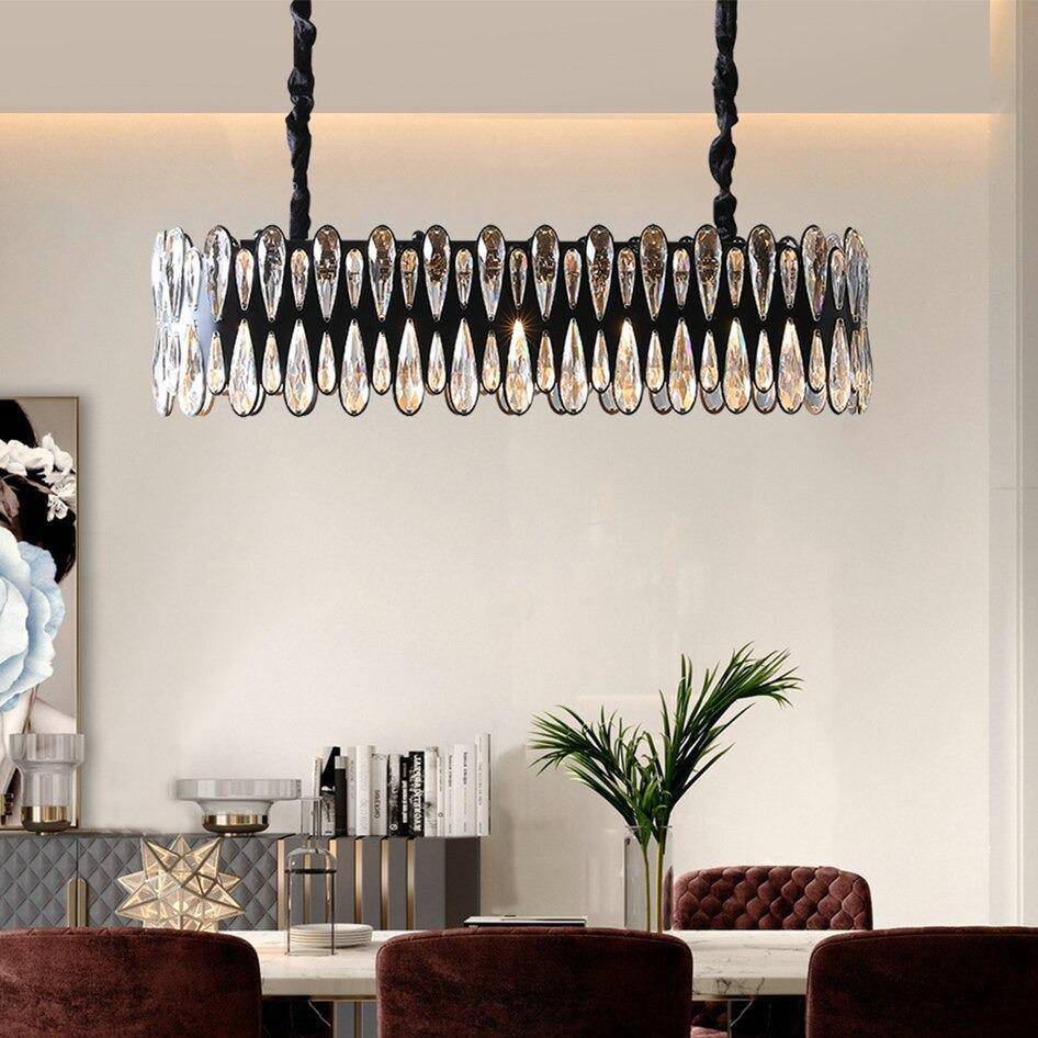 Side view of the Napoli 36-inch linear crystal chandelier by Morsale.com showing the ornate steel arms.