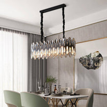 The Napoli dining chandelier by Morsale.com over a kitchen island, genuine K9 crystal on stainless steel.