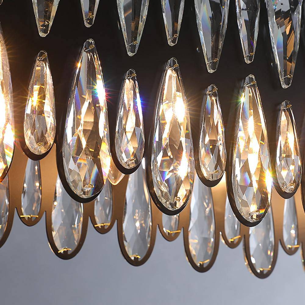 The Napoli linear crystal chandelier by Morsale.com illuminated in a dining room, Italian-inspired design.