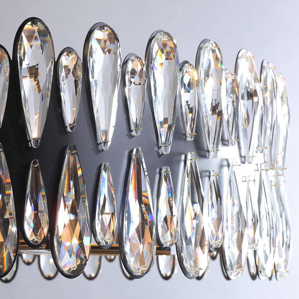 Side view of the Napoli round crystal chandelier by Morsale.com showing the organic architectural arm form.
