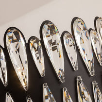 The Napoli crystal chandelier from Morsale.com casting sparkle in a foyer, K9 crystal on polished steel arms.