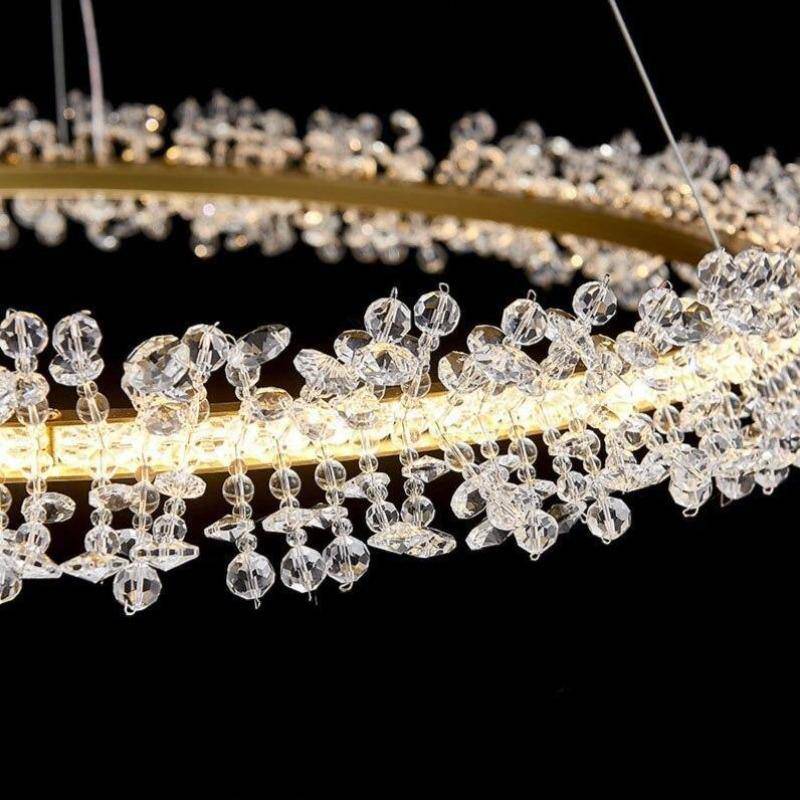 Capri crystal ring chandelier in a modern bedroom setting