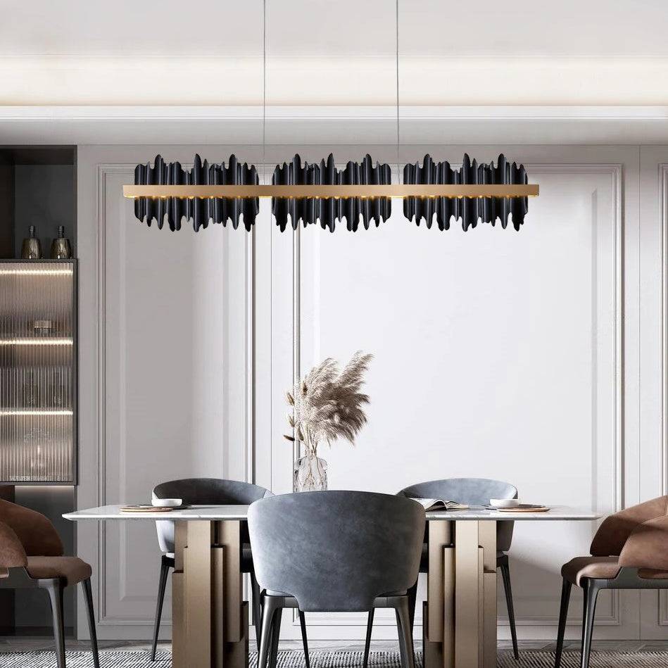 Detail of the Rivaro linear chandelier's black and gold frame