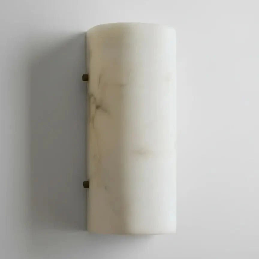 Auris marble wall sconce mounted in a hallway