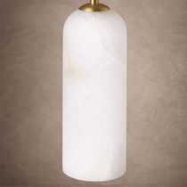 Mirasol marble and brass wall sconce in a hallway setting