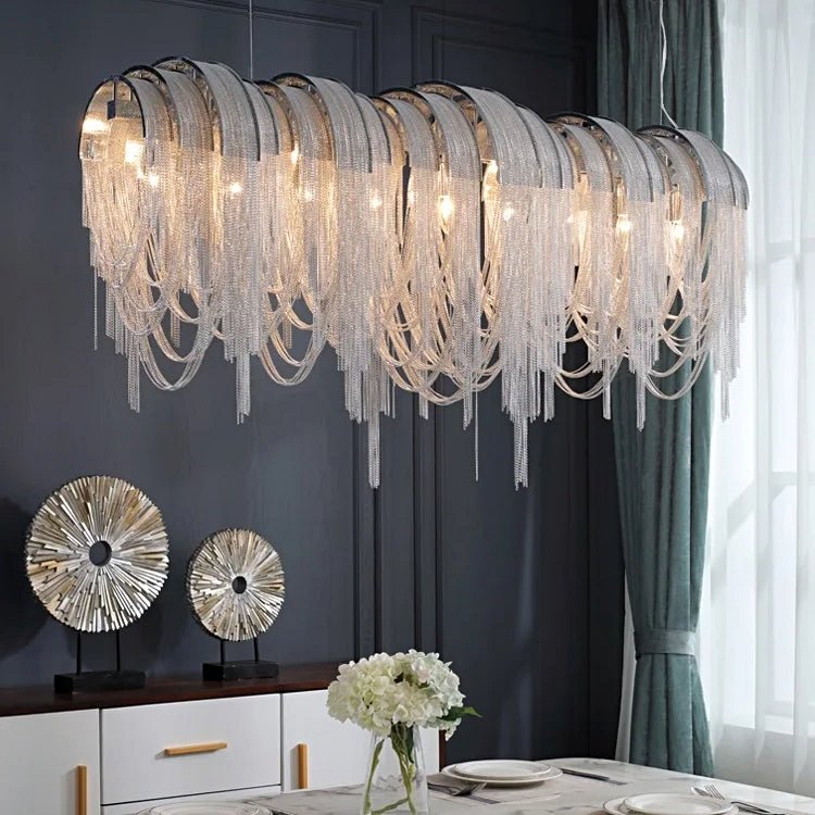 Cadena chain tassel dining room chandelier by Morsale.com, a 47-inch cascade of stainless steel and aluminum tassels above a dining table. Main image