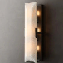 Brookhill calcite wall sconce mounted on a wall