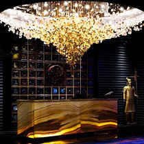 Piovere multi pendant chandelier in a stairwell