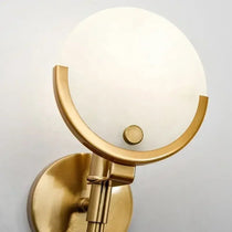 Vellaro marble sconce side profile on its iron bracket