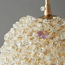 Detail of crystal prisms on the El Sol sconce