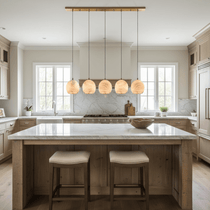 Auris 5-light linear marble chandelier over a dining table