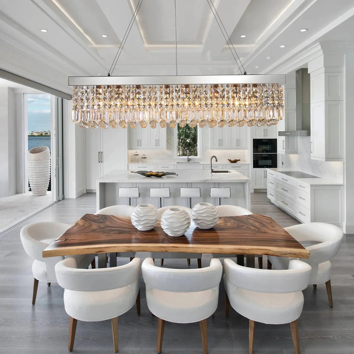 Gio 47-inch clear crystal dining chandelier over a dining table Main image