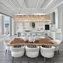 Gio 47-inch clear crystal dining chandelier over a dining table