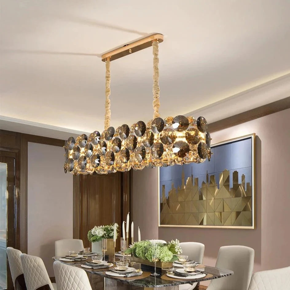 Monte rectangular K9 crystal chandelier over a dining table