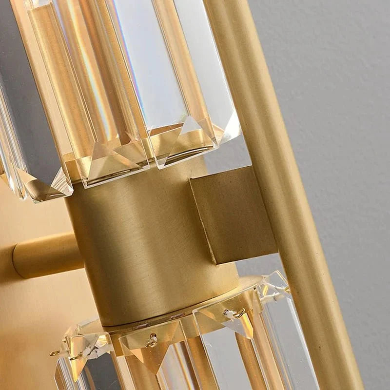 Close-up of the solid brass body on the Gio crystal sconce