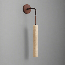 Terra travertine sconce with warm glowing stone shade