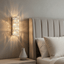 Bacci compact crystal LED wall sconce with layered K9 prisms