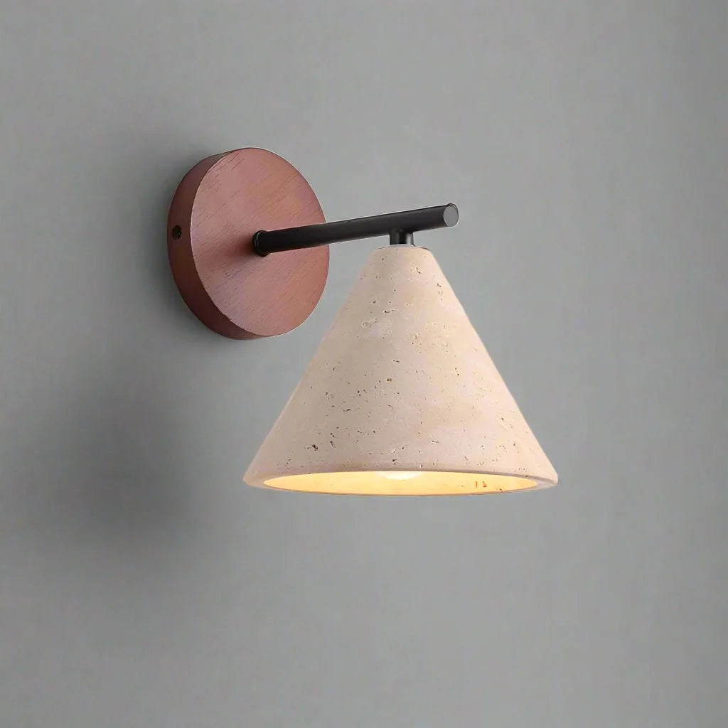 Siena travertine and wood wall sconce mounted on a wall