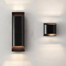 Rame solid copper wall sconce with warm up and down glow