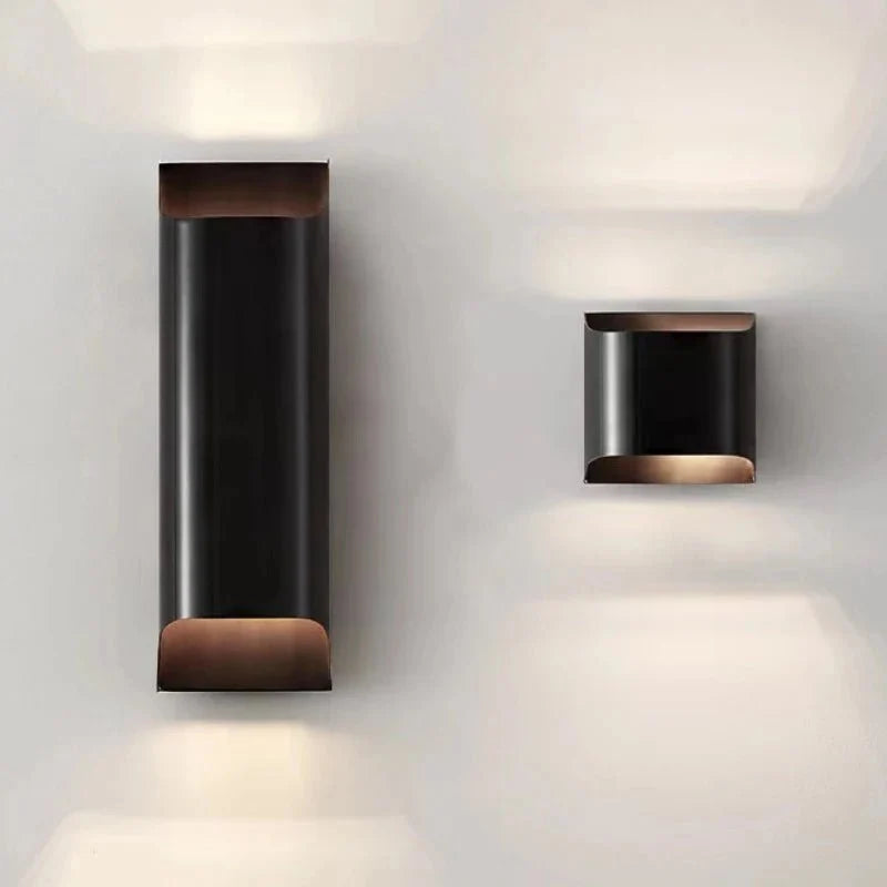 Rame solid copper wall sconce with warm up and down glow