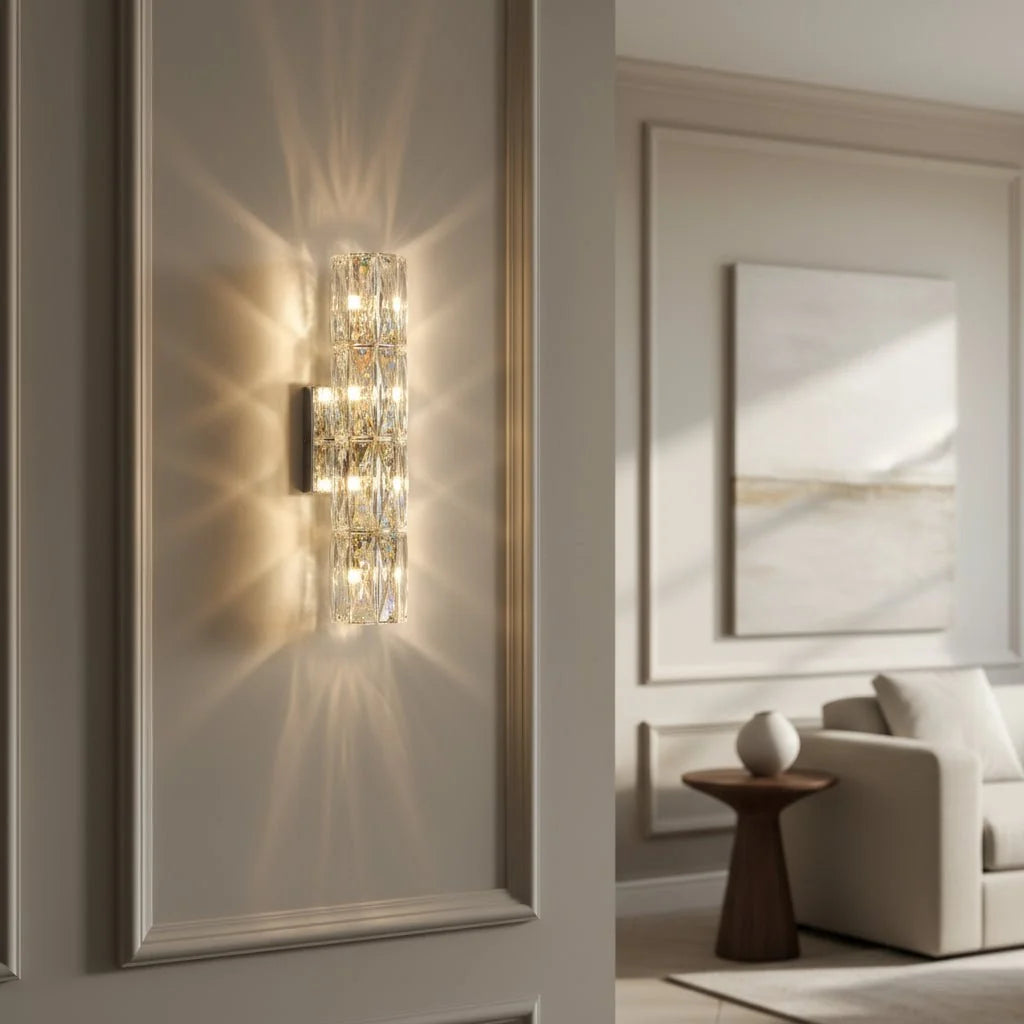 Bacci linear crystal sconce illuminated on a wall