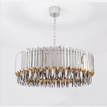 Legance modern chandelier by Morsale.com, distinctive smokey crystals on a polished stainless steel frame above a dining table.