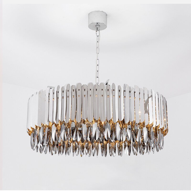Legance modern chandelier by Morsale.com, distinctive smokey crystals on a polished stainless steel frame above a dining table.