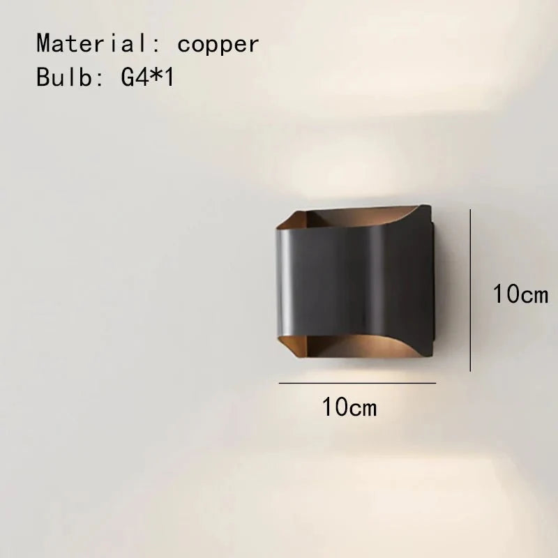 Close-up of the warm copper finish on the Rame sconce