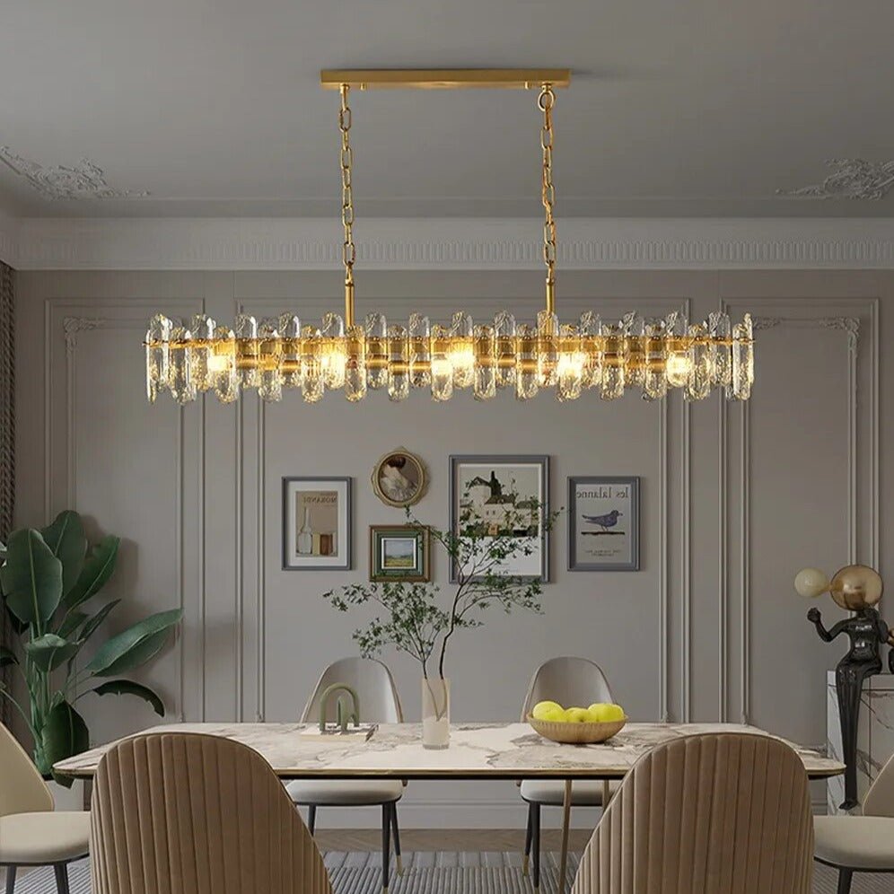 Marini 59-inch linear crystal chandelier over a long dining table Main image